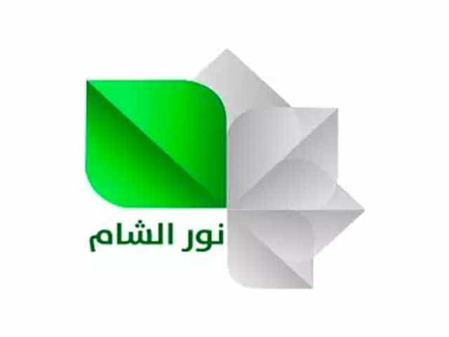 The logo of Nour El Sham TV