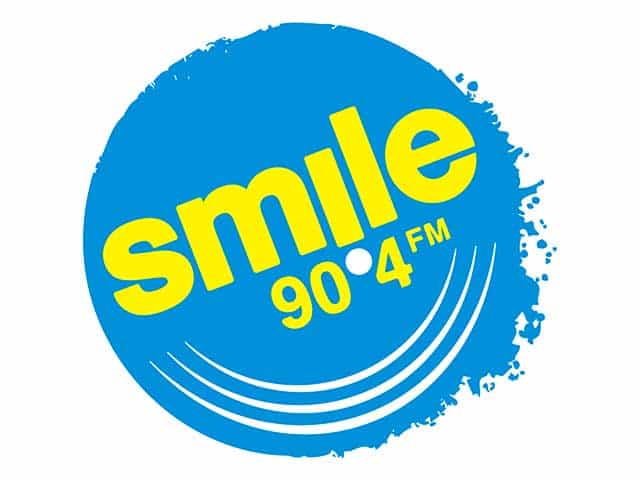 The logo of Smile 90.4FM
